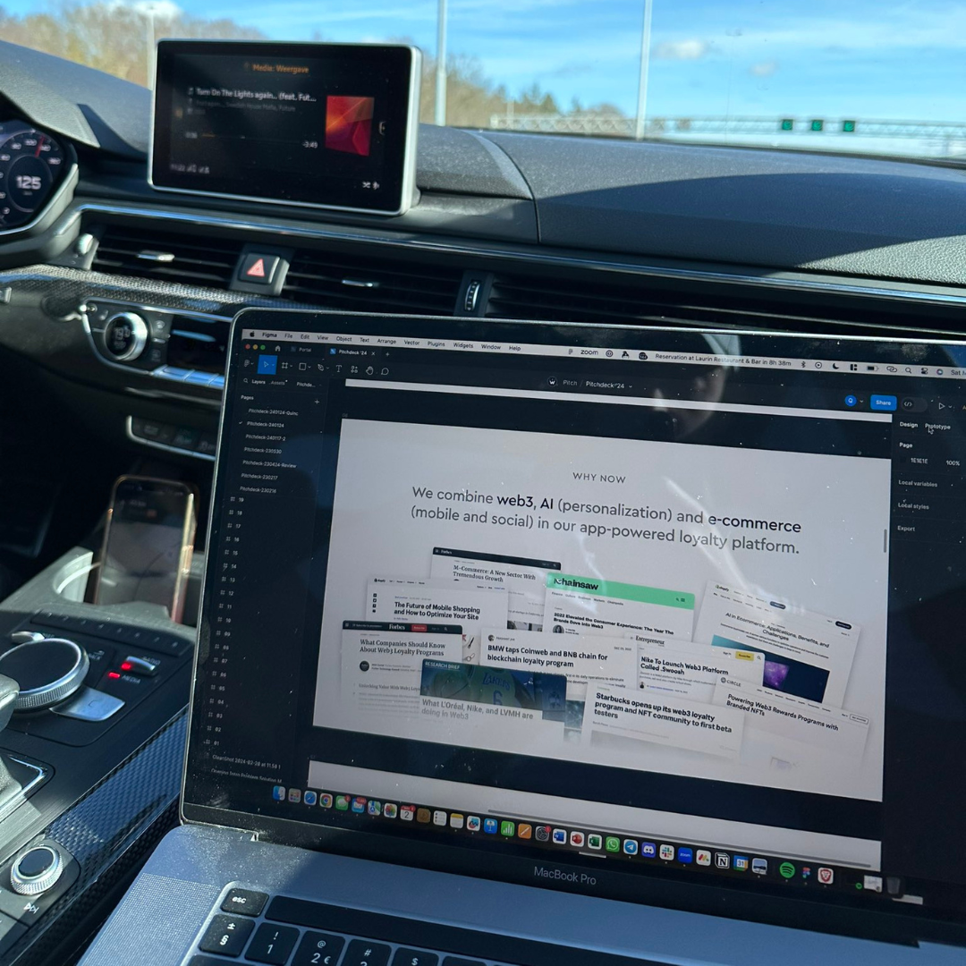 quincy working on pitch deck in car